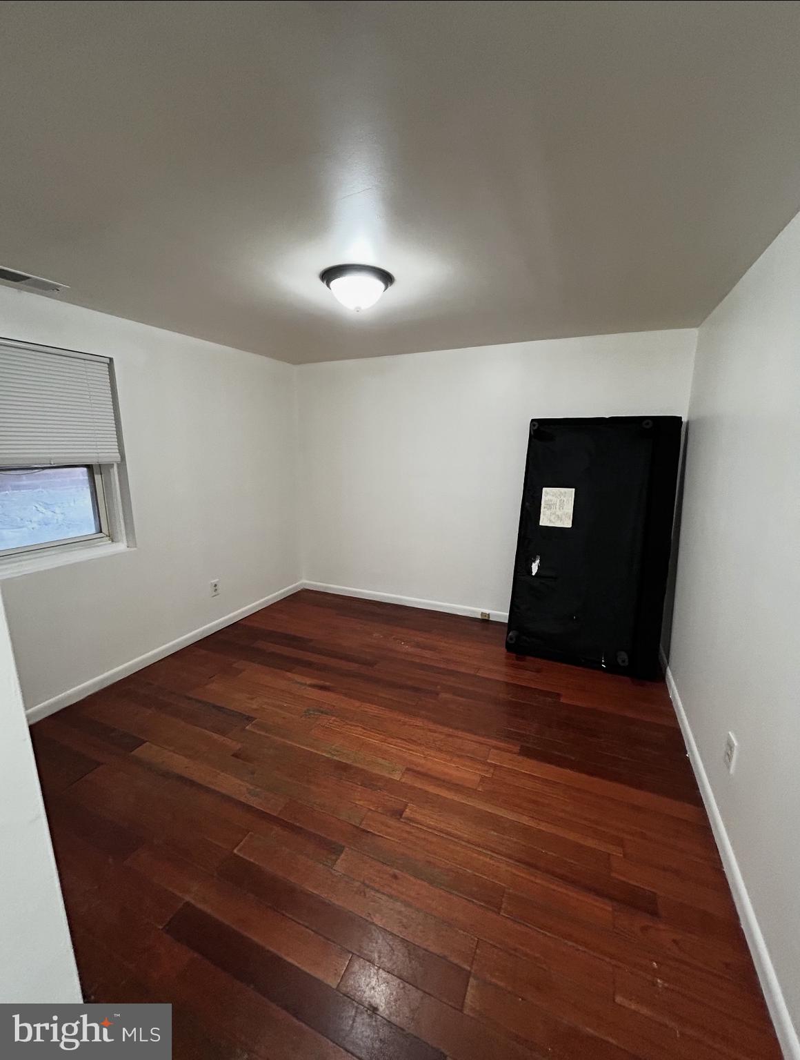 2216 North Broad Street, Unit 2R Philadelphia, PA 19132 - Photo 1 of 4 a view of empty room with wooden floor