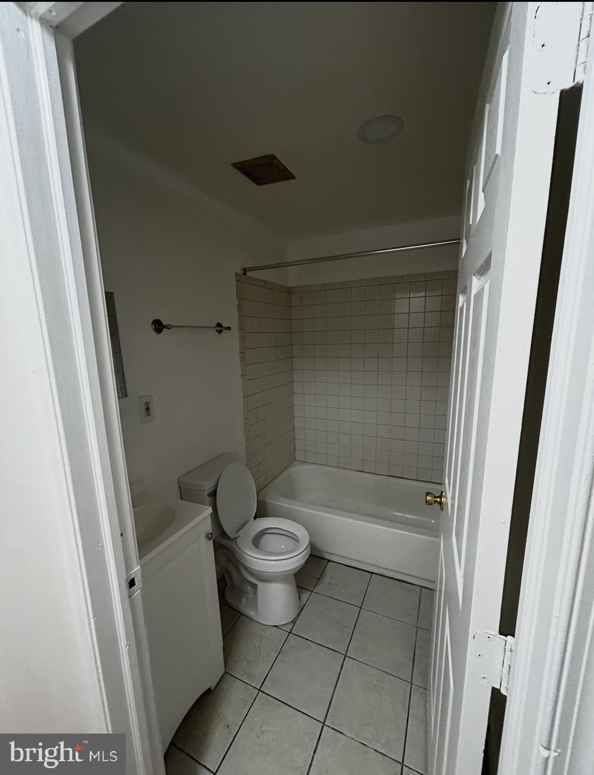 2216 North Broad Street, Unit 2R Philadelphia, PA 19132 - Photo 3 of 4 a bathroom with a toilet and a shower