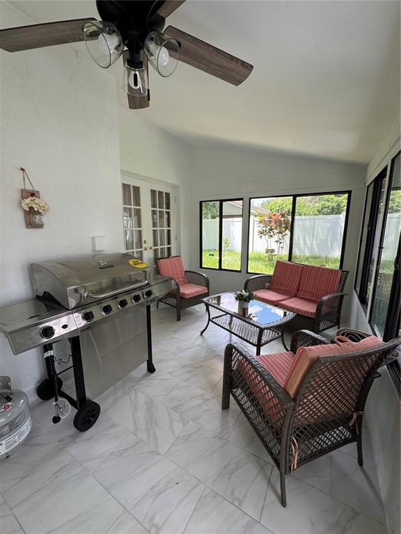 2633 Lanier Road Kissimmee, FL 34744 - Photo 21 of 45 a living room with furniture and a window