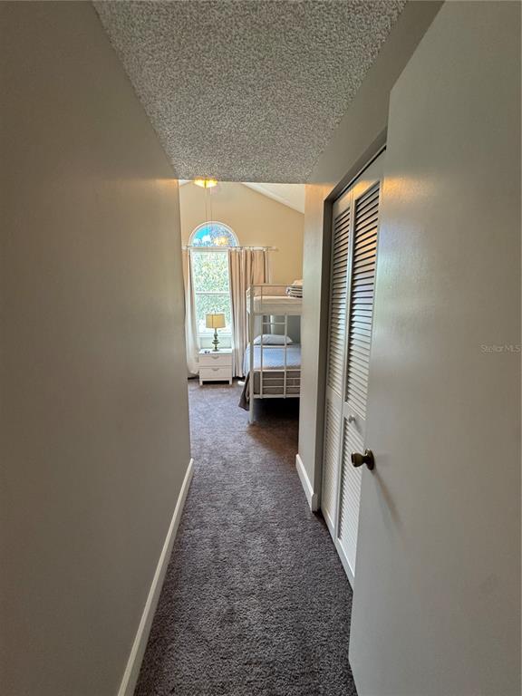 2633 Lanier Road Kissimmee, FL 34744 - Photo 37 of 45 a view of hallway with livingroom