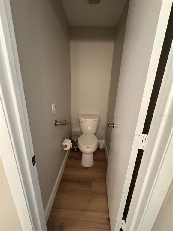 2633 Lanier Road Kissimmee, FL 34744 - Photo 41 of 45 a bathroom with a toilet and a walk in closet