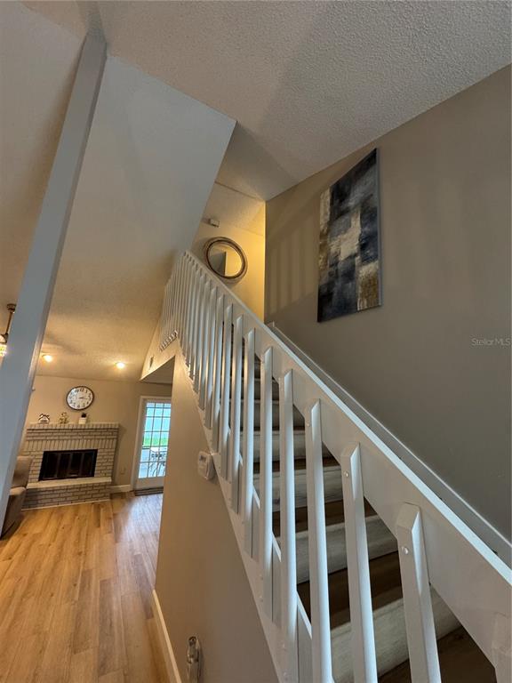 2633 Lanier Road Kissimmee, FL 34744 - Photo 6 of 45 a view of entryway and hall with wooden floor