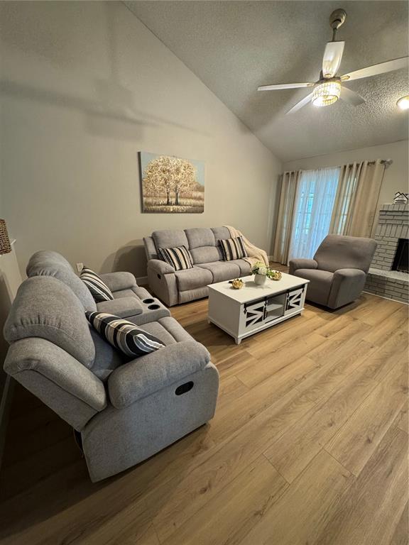 2633 Lanier Road Kissimmee, FL 34744 - Photo 9 of 45 a living room with furniture and a lamp