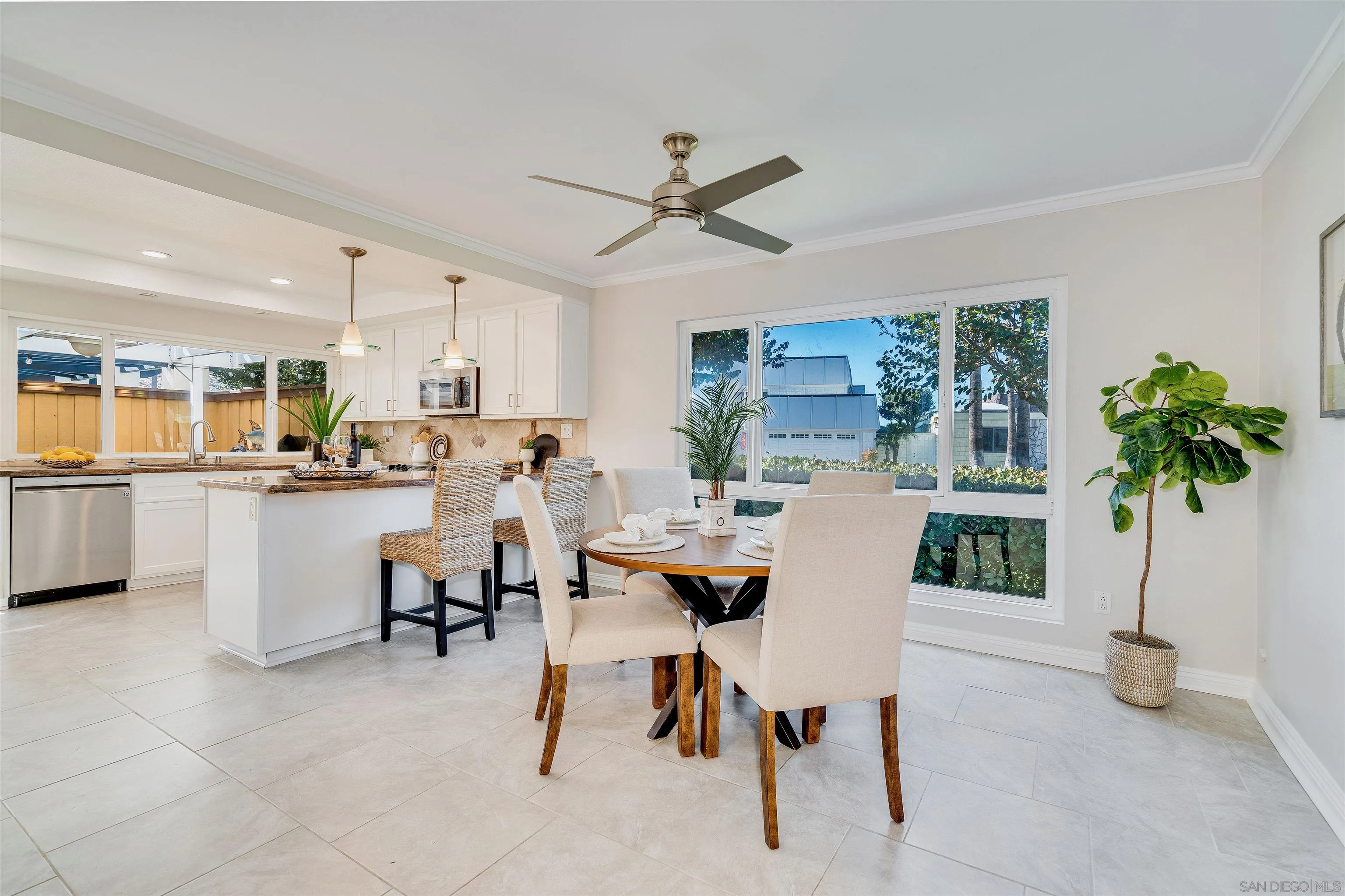 20 GingerTree Lane Coronado, CA 92118 - Photo 12 of 45 a view of a dining room with furniture window and wooden floor