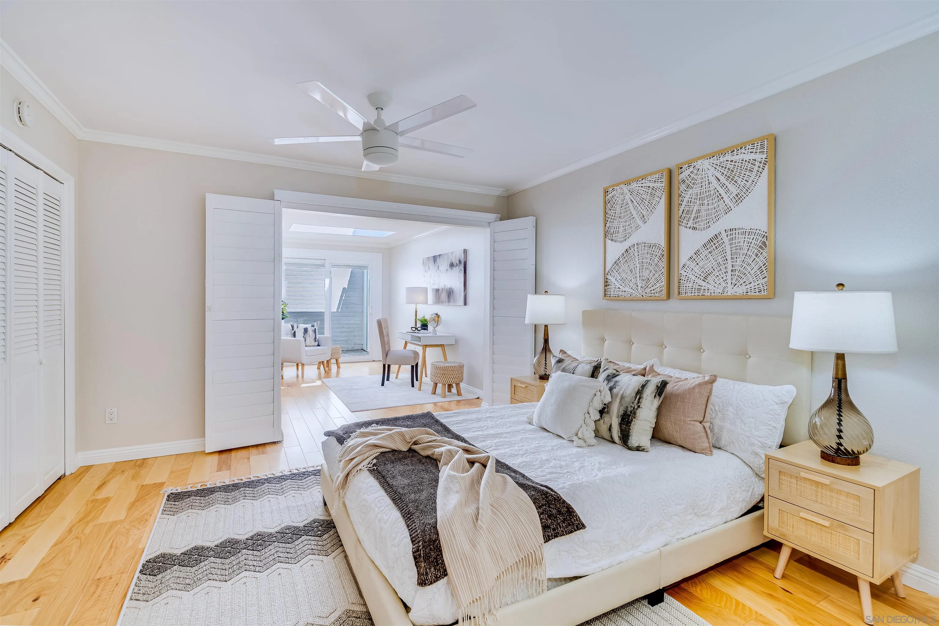 20 GingerTree Lane Coronado, CA 92118 - Photo 16 of 45 a bedroom with a bed and lamp