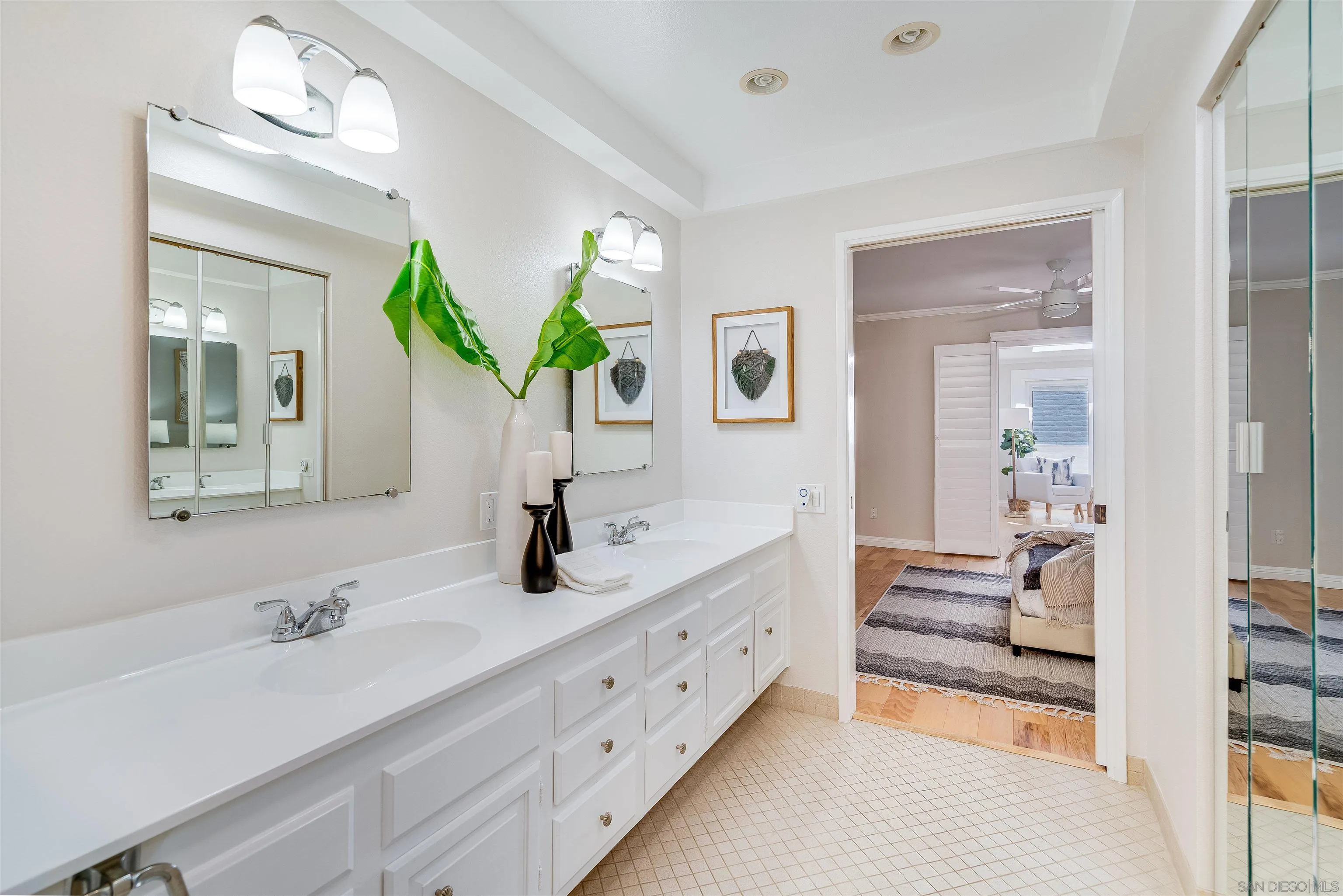 20 GingerTree Lane Coronado, CA 92118 - Photo 18 of 45 a en suite bathroom with double sink and a mirror