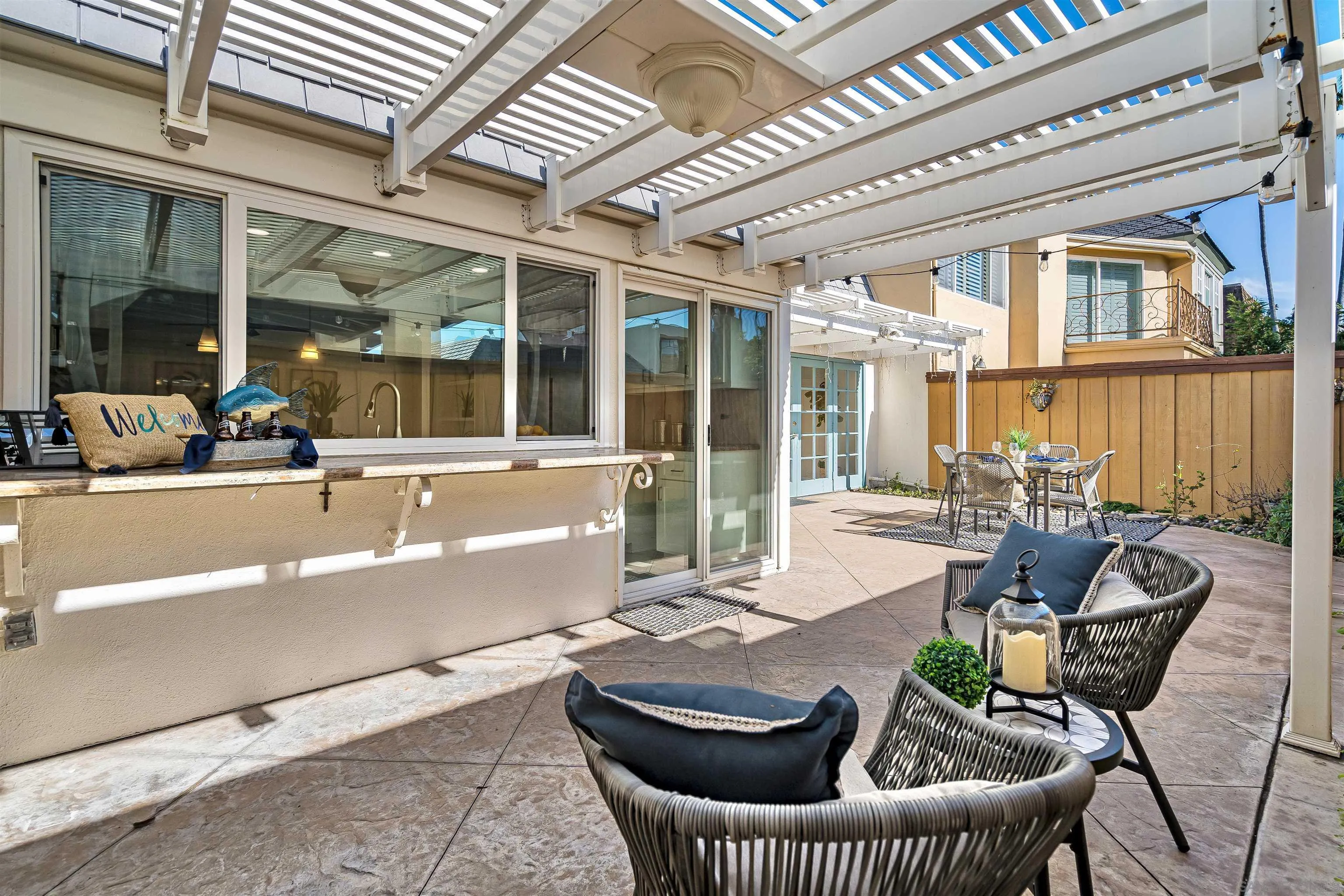 20 GingerTree Lane Coronado, CA 92118 - Photo 28 of 45 a living room with furniture and a large window