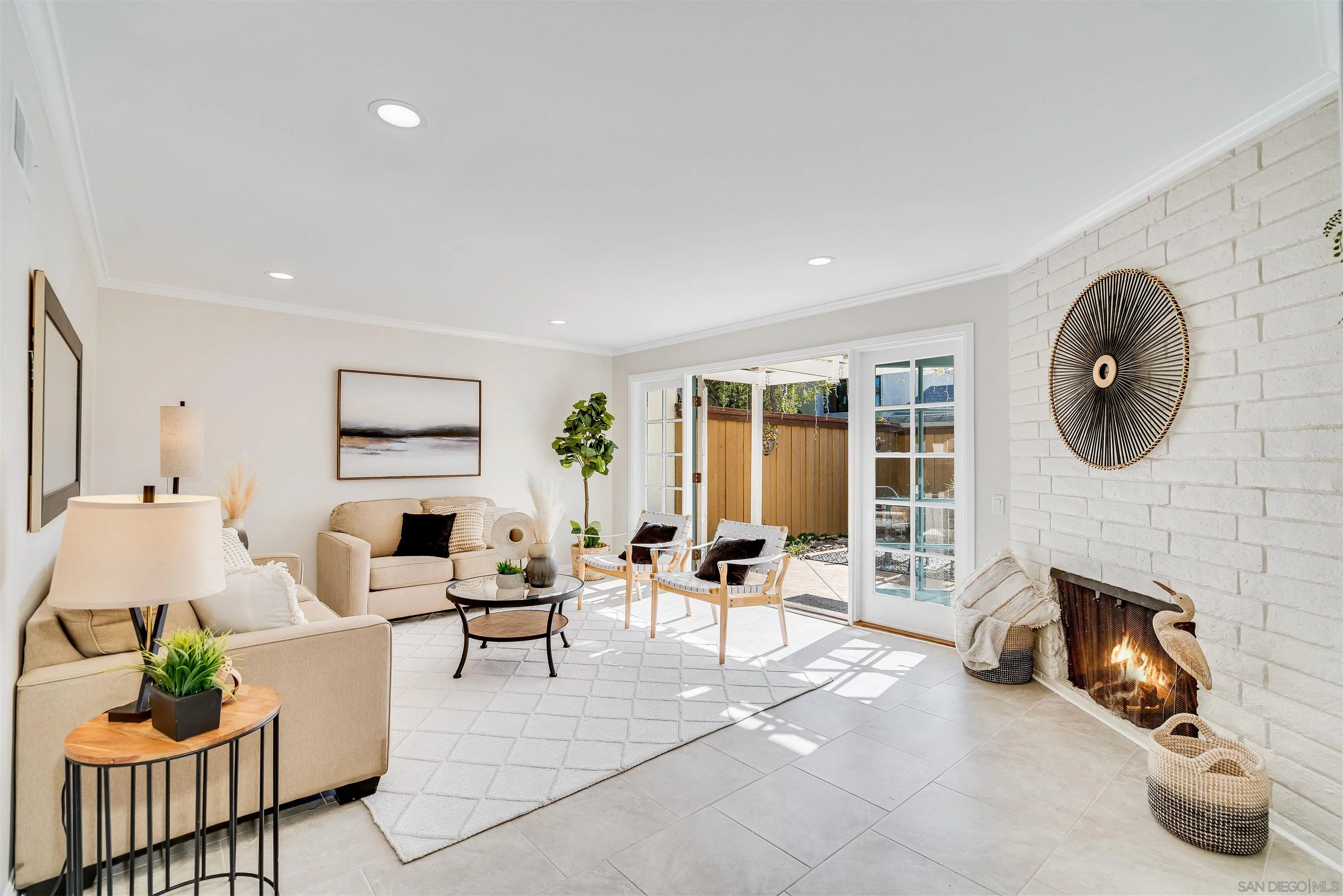 20 GingerTree Lane Coronado, CA 92118 - Photo 5 of 45 a living room with furniture and a fireplace