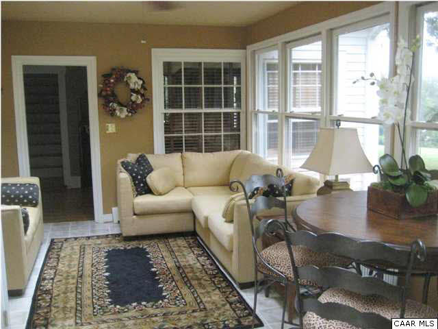 268 Rivanna Mills Road Palmyra, VA 22963 - Photo 21 of 31 a living room with furniture and a window