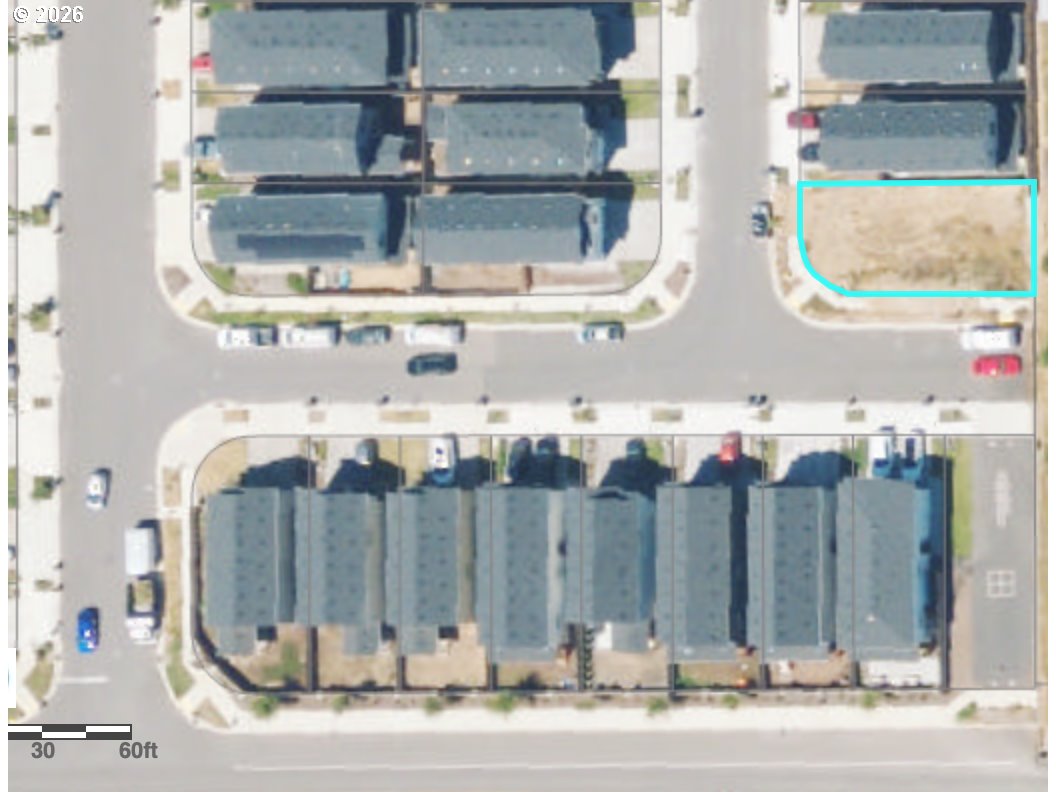 1030 North Auburn Place Ridgefield, WA 98642 - Photo 4 of 4 a view of a building with traffic signal