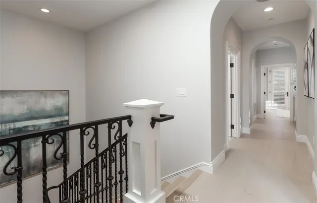 a view of a hallway with windows