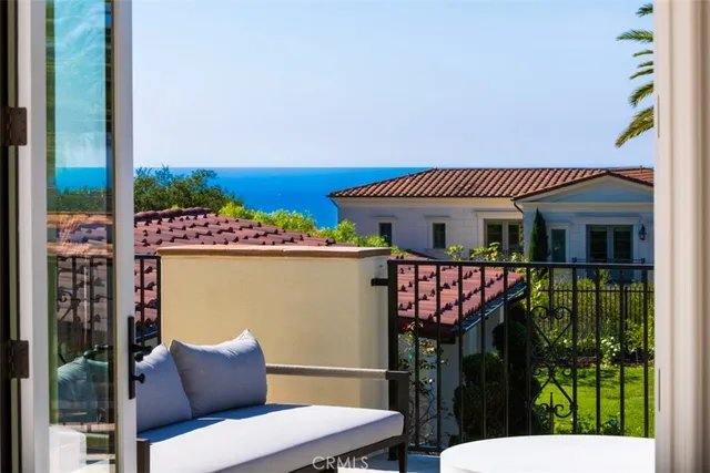 a view of a balcony with book potted plants