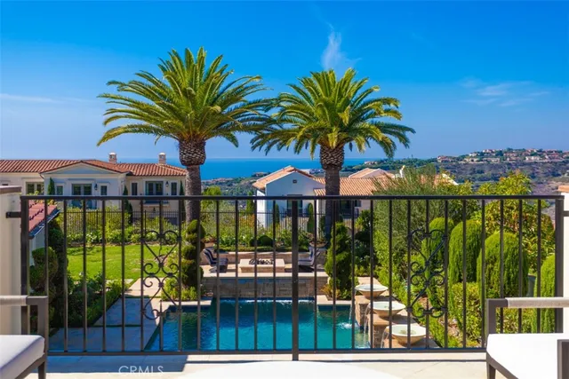 a view of a palm trees in front of house