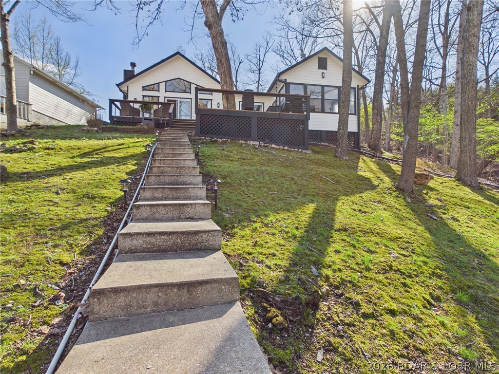 33433 Englewood Road Sunrise Beach, MO 65079 - Photo 1 of 54 Lake view of home