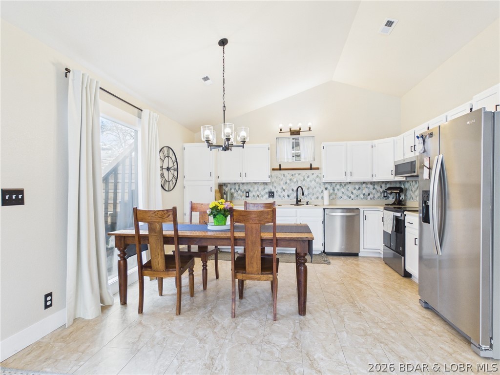 33433 Englewood Road Sunrise Beach, MO 65079 - Photo 11 of 54 Nice open kitchen space