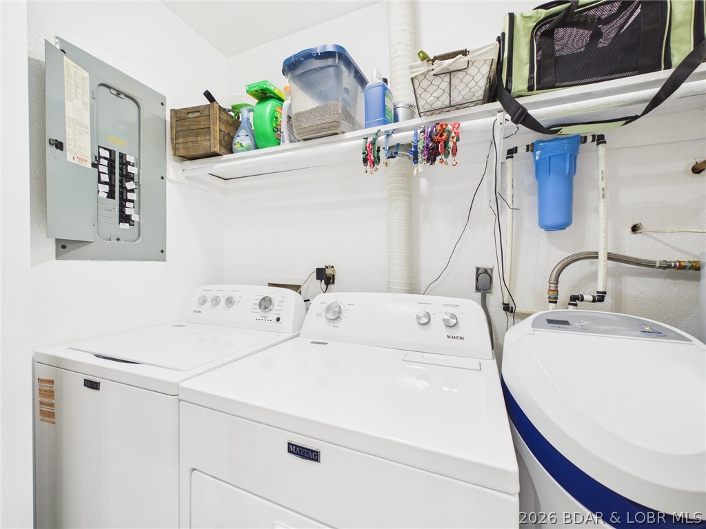 33433 Englewood Road Sunrise Beach, MO 65079 - Photo 17 of 54 Laundry area along with the HVAC system and water