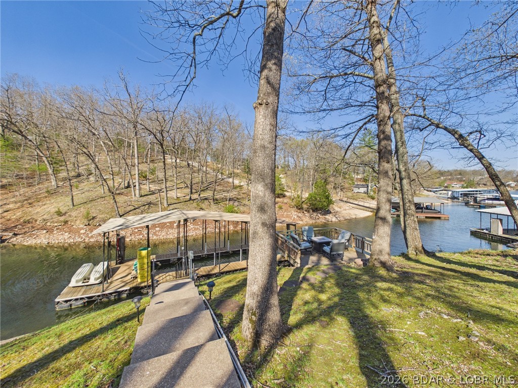 33433 Englewood Road Sunrise Beach, MO 65079 - Photo 2 of 54 View walking down the steps to the dock and martin