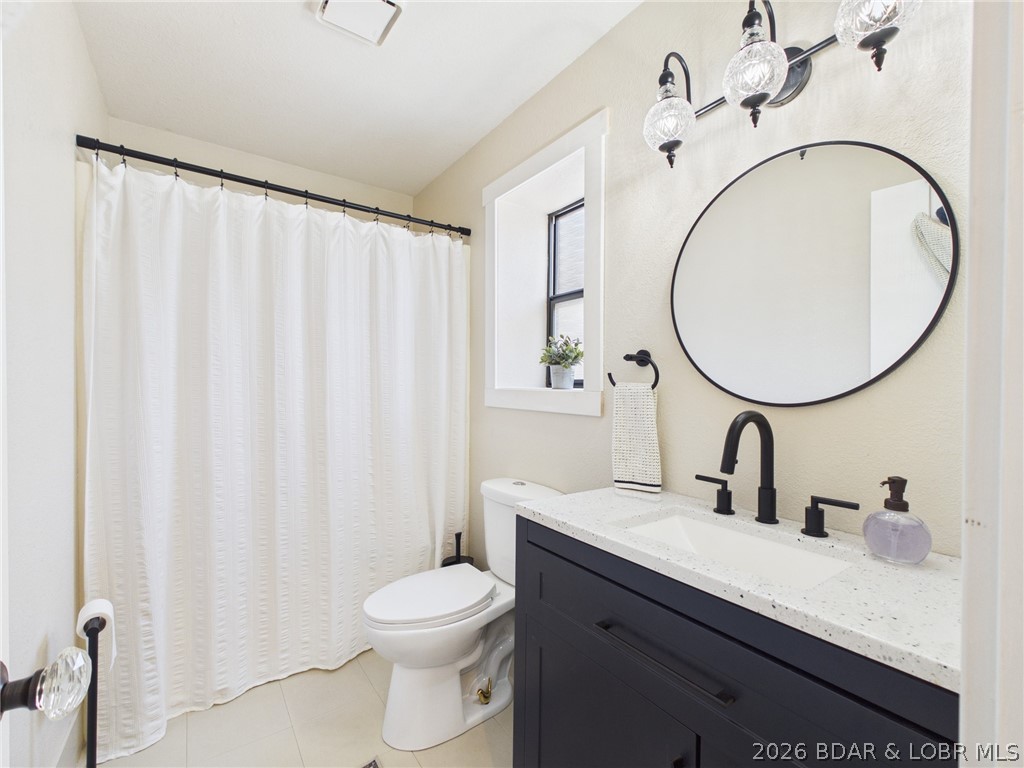 33433 Englewood Road Sunrise Beach, MO 65079 - Photo 26 of 54 Master bathroom