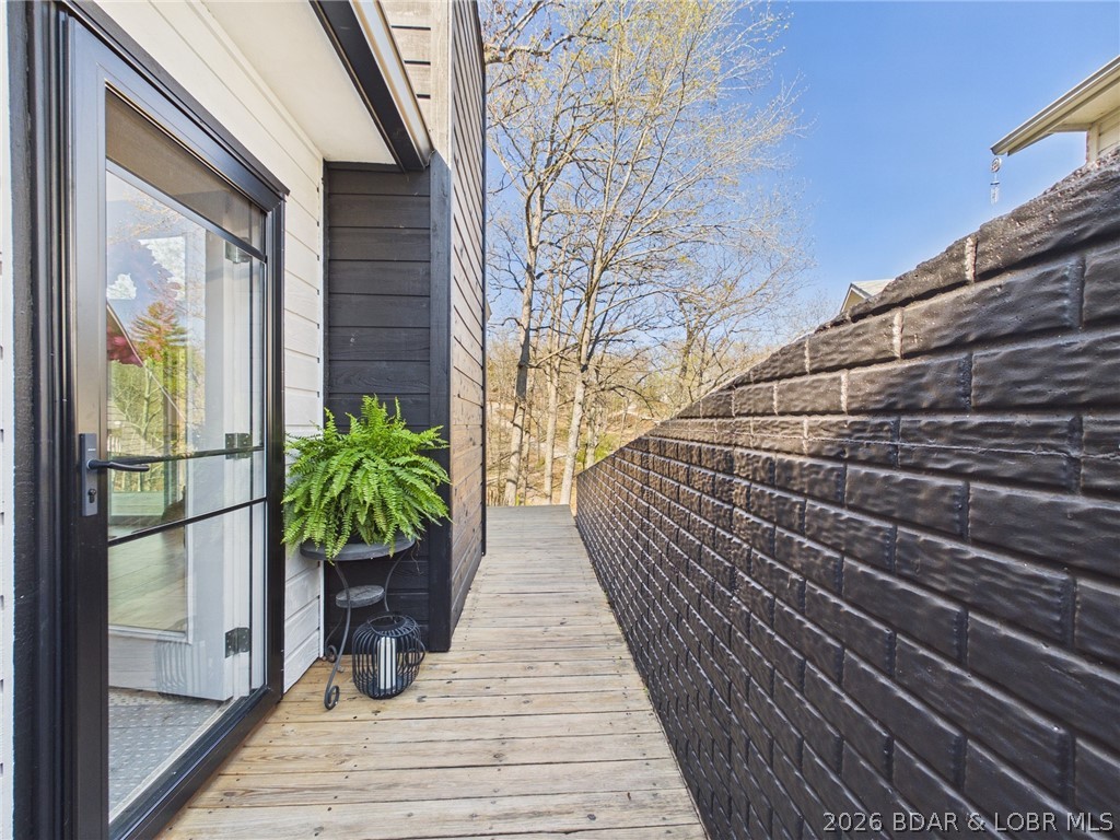 33433 Englewood Road Sunrise Beach, MO 65079 - Photo 34 of 54 Entry way to the house and the deck