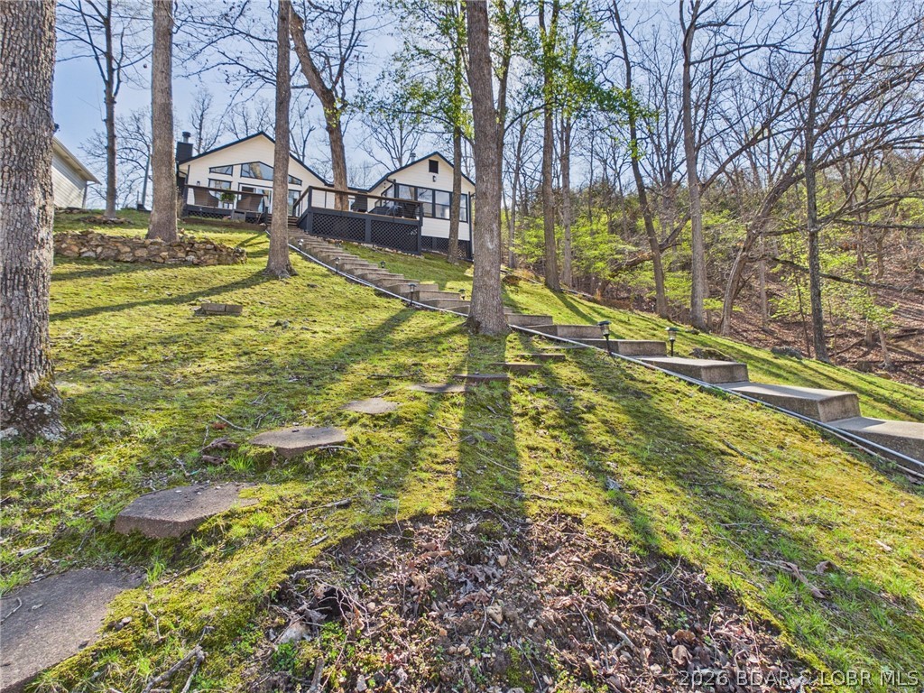 33433 Englewood Road Sunrise Beach, MO 65079 - Photo 40 of 54 Martini deck looking to the house