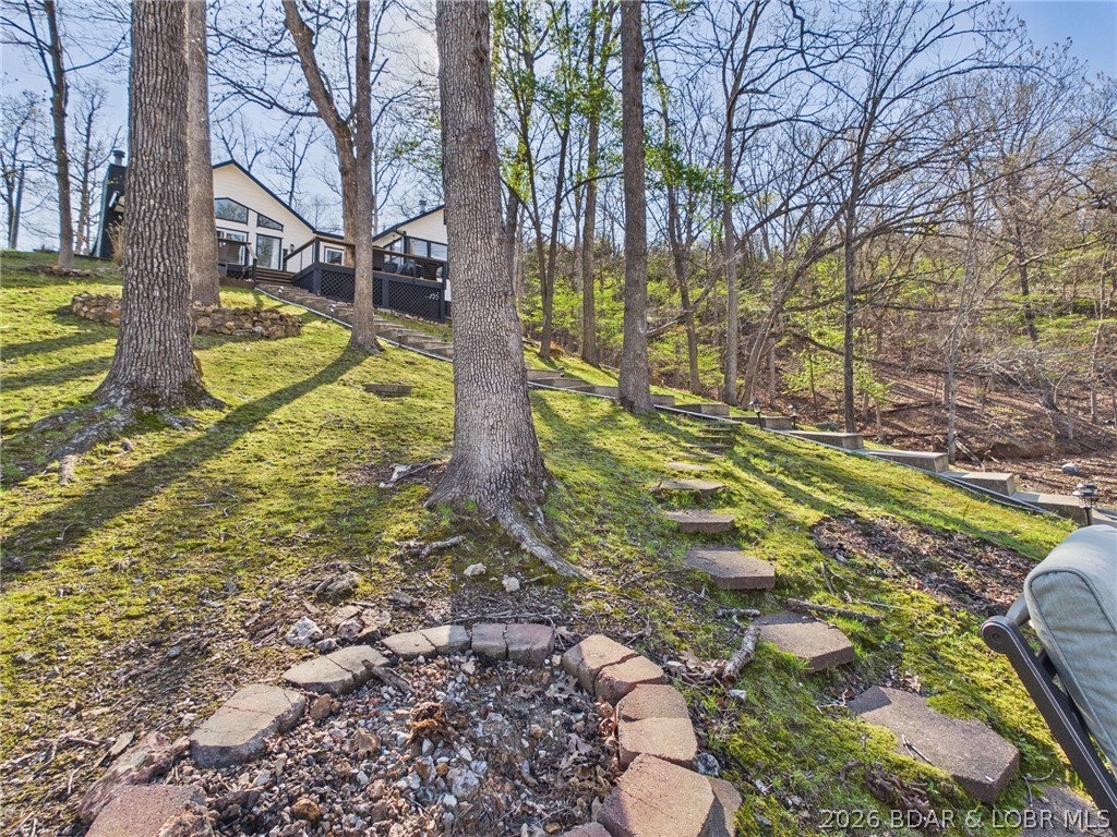 33433 Englewood Road Sunrise Beach, MO 65079 - Photo 45 of 54 Mossy yard, perfect for no maintenance