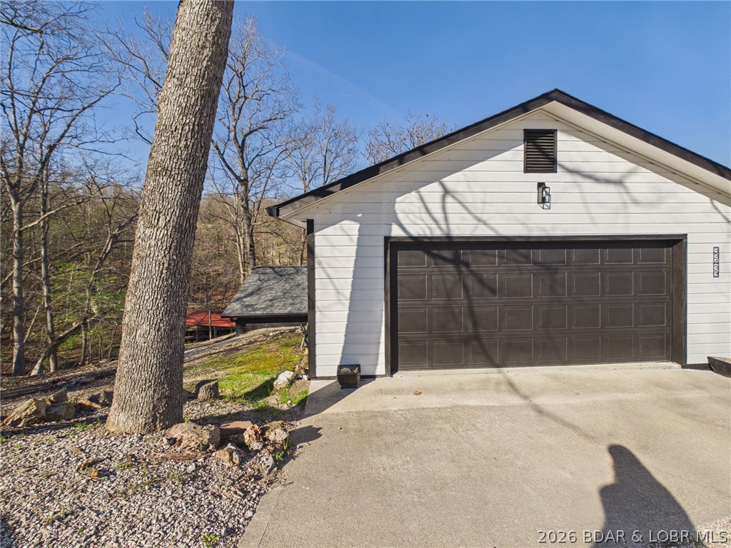 33433 Englewood Road Sunrise Beach, MO 65079 - Photo 51 of 54 Heated garage