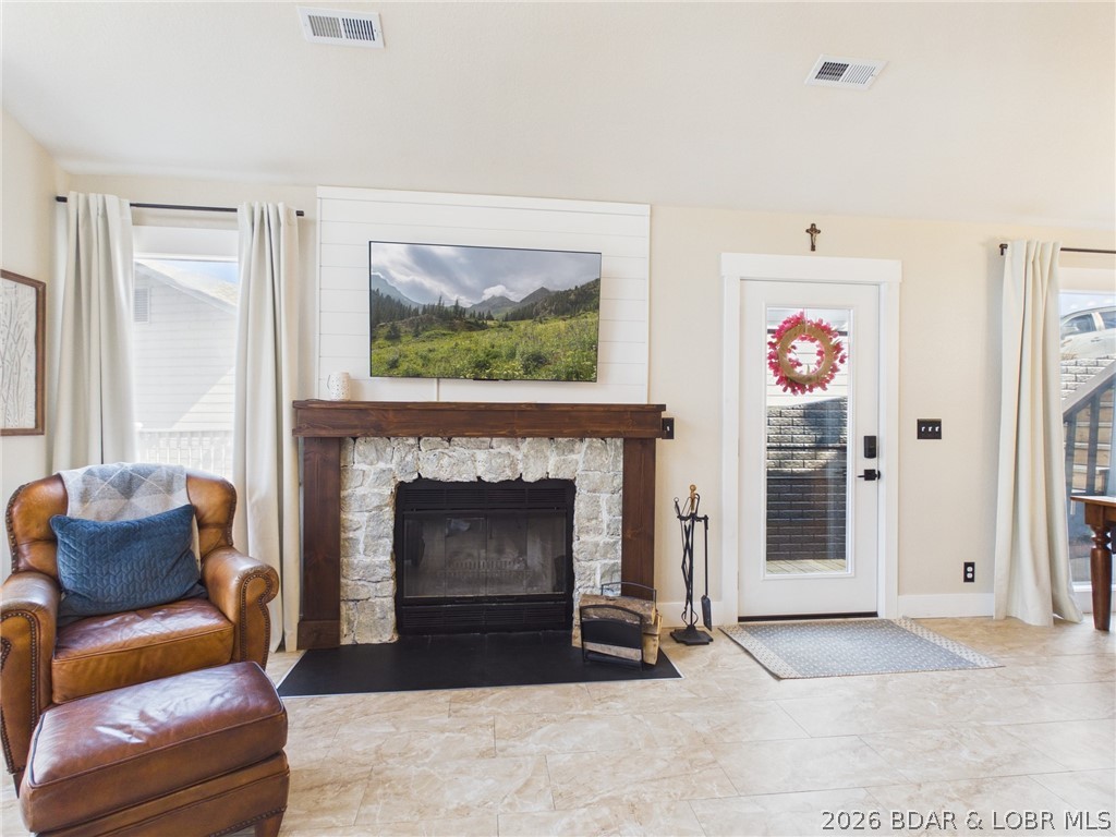 33433 Englewood Road Sunrise Beach, MO 65079 - Photo 8 of 54 Beautiful wood burning fireplace