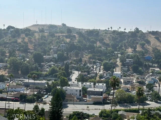 a view of a backyard of the house