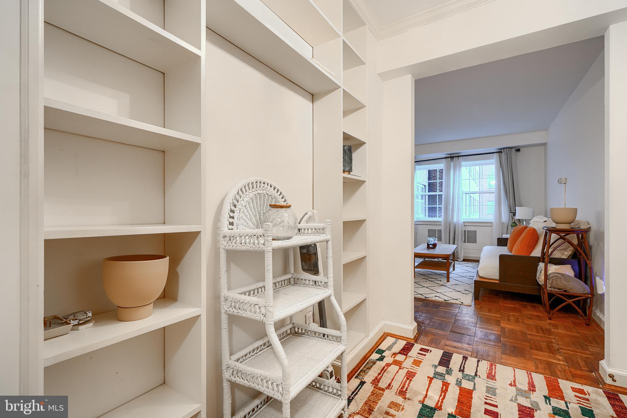 3601 Greenway, Unit 303 Baltimore, MD 21218 - Photo 1 of 30 a view of a livingroom with furniture and wooden floor