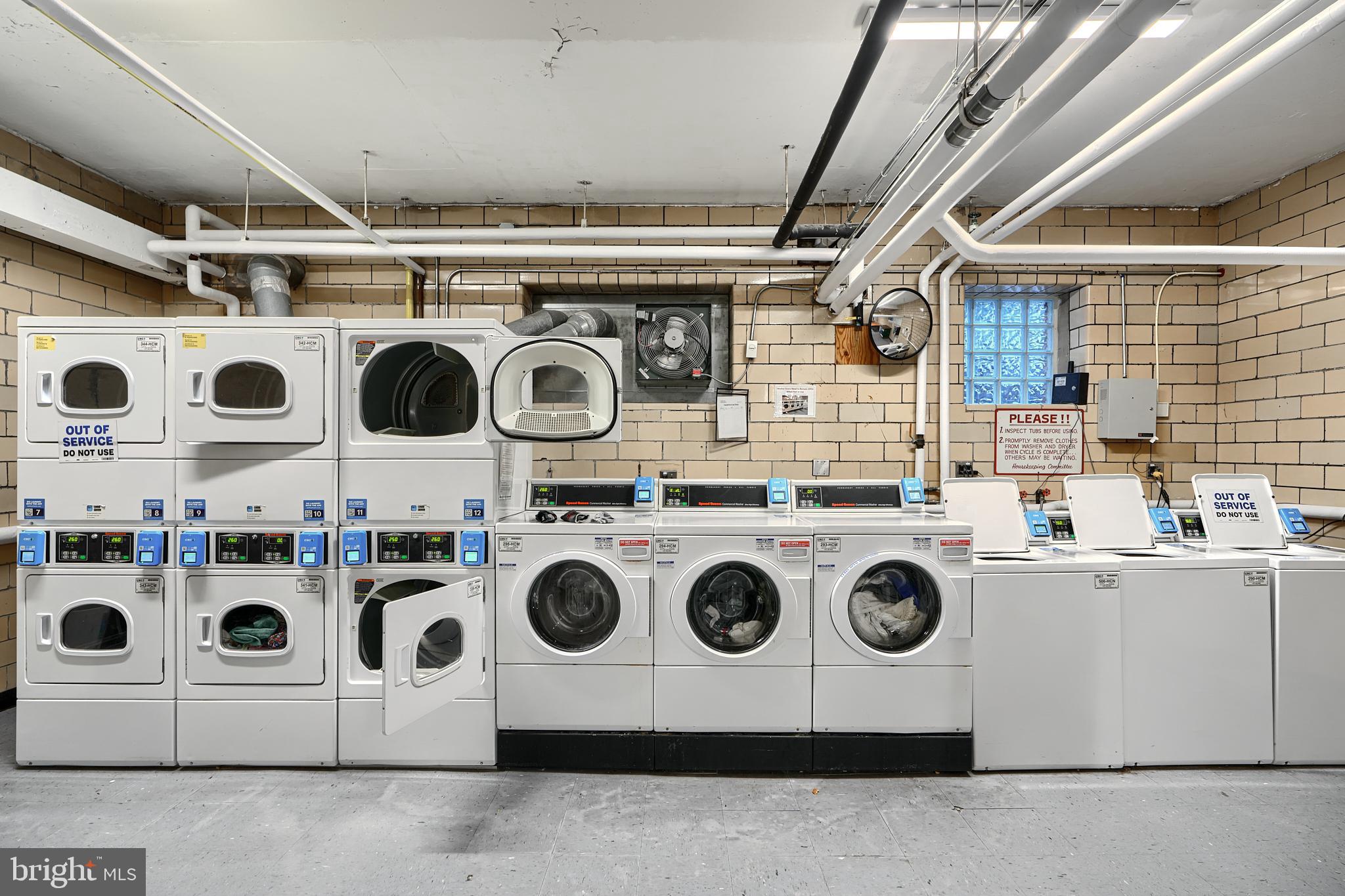 3601 Greenway, Unit 303 Baltimore, MD 21218 - Photo 23 of 30 a utility room with dryer and washer
