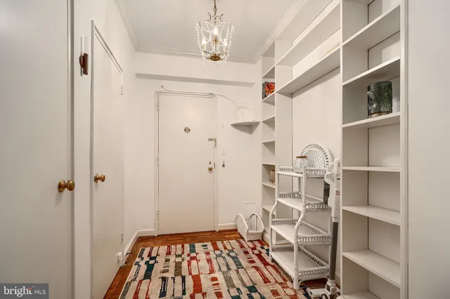 a view of entryway with wooden floor