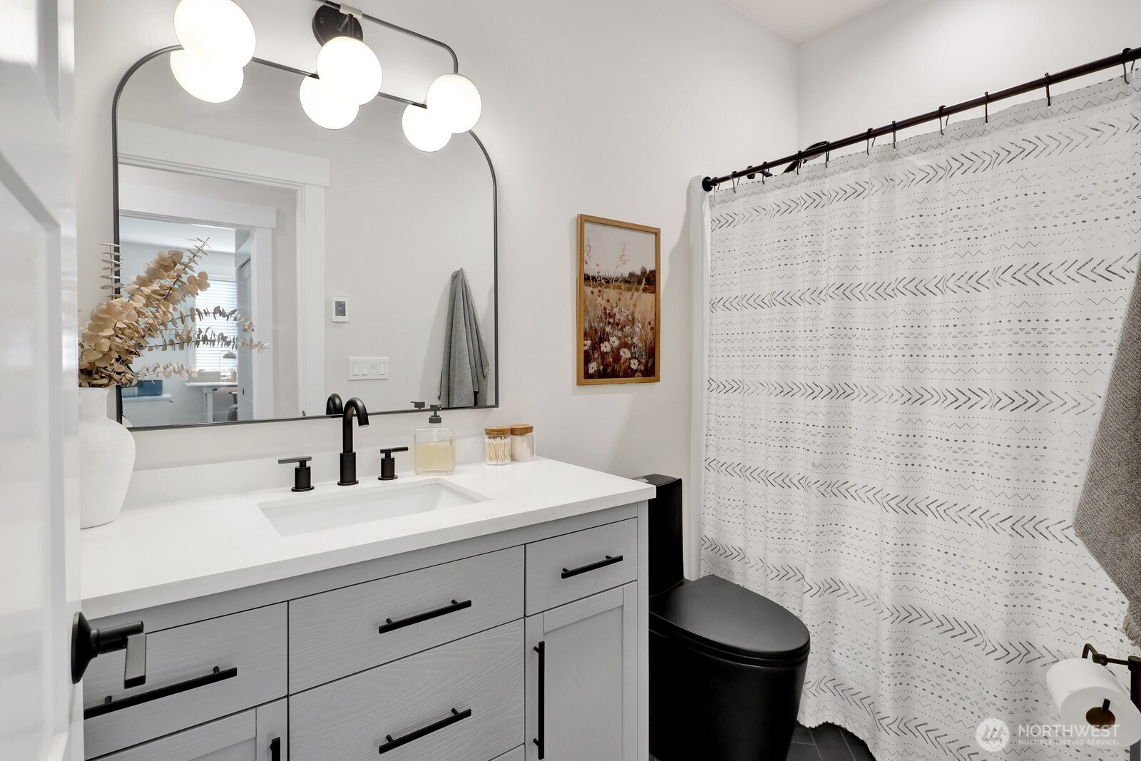 8228 Goldrun Drive Maple Falls, WA 98266 - Photo 23 of 33 a bathroom with a sink a toilet and a mirror