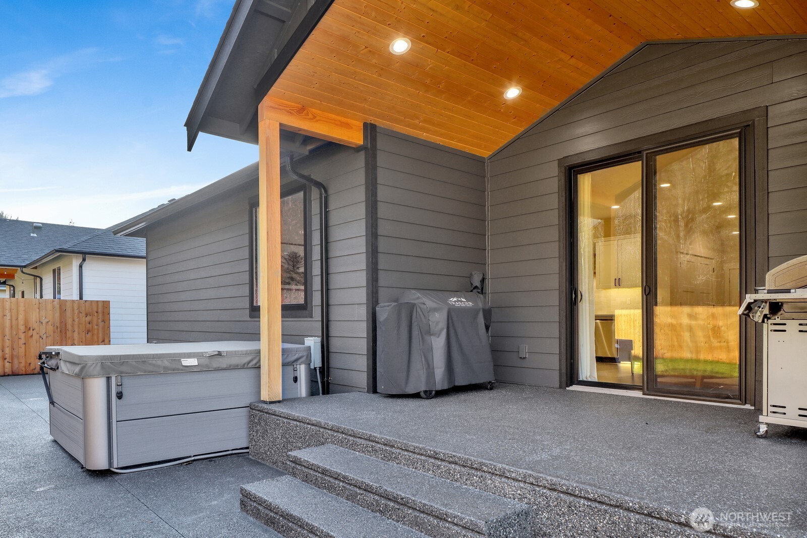 8228 Goldrun Drive Maple Falls, WA 98266 - Photo 5 of 33 a view of a patio with table and chairs and a barbeque