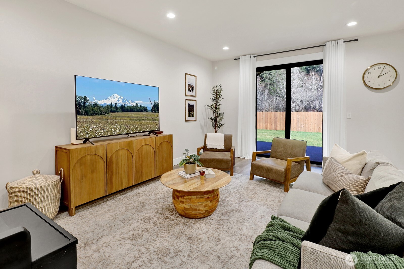 8228 Goldrun Drive Maple Falls, WA 98266 - Photo 8 of 33 a living room with furniture and a flat screen tv