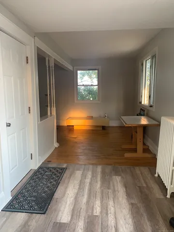a view of a kitchen from the hallway