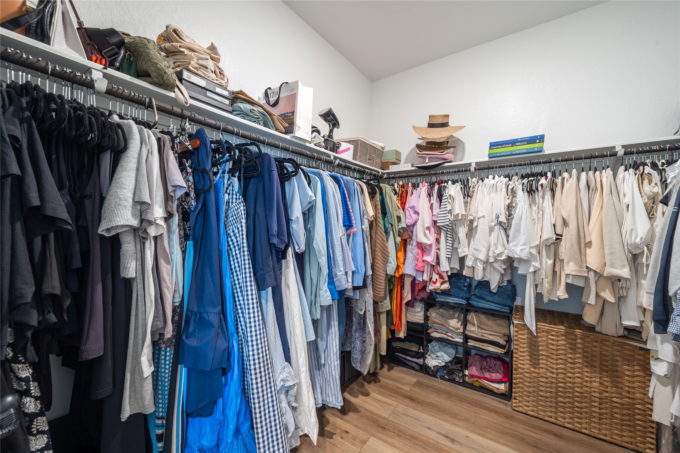 14404 Berning Road Manor, TX 78653 - Photo 21 of 38 Ample hanging space and integrated shelving create an organized wardrobe sanctuary.