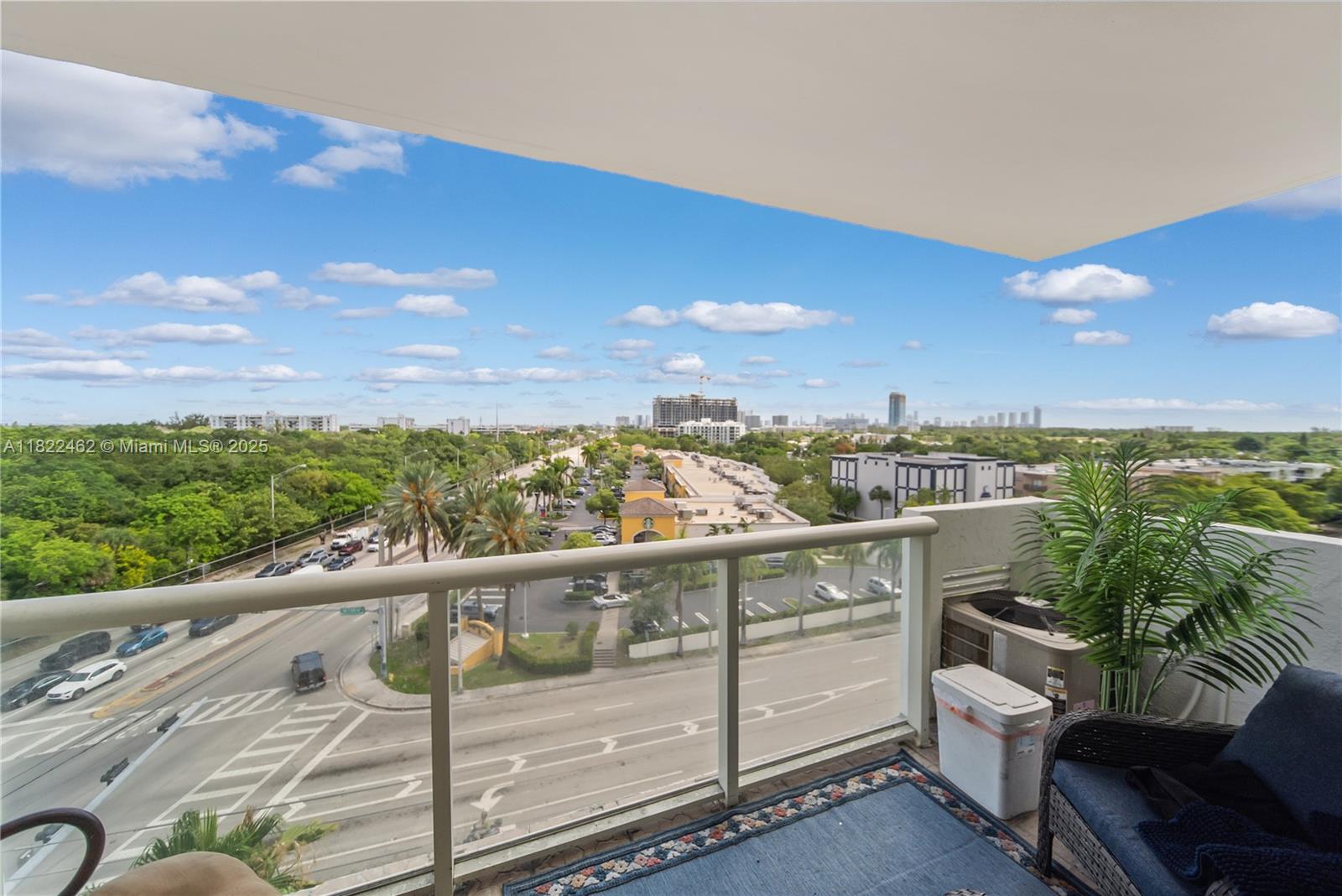 13499 Biscayne Boulevard, Unit 703 North Miami, FL 33181 - Photo 3 of 38 a view of a terrace with skyline