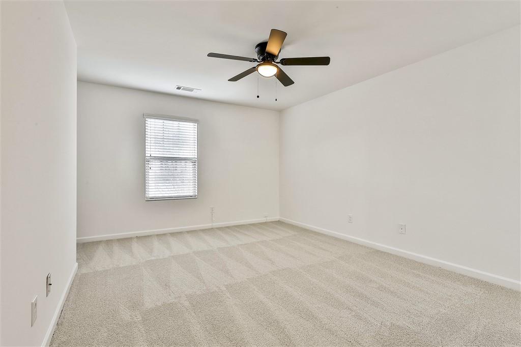 7365 St Peter Way Fairburn, GA 30213 - Photo 12 of 19 a view of an empty room with a window