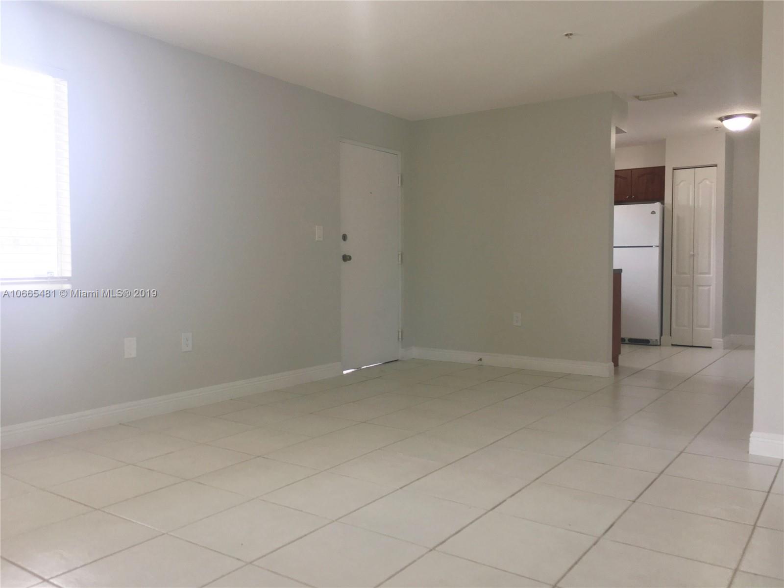 1453 Southwest 3rd Street, Unit 305 Miami, FL 33135 - Photo 2 of 12 an empty room with a bathroom
