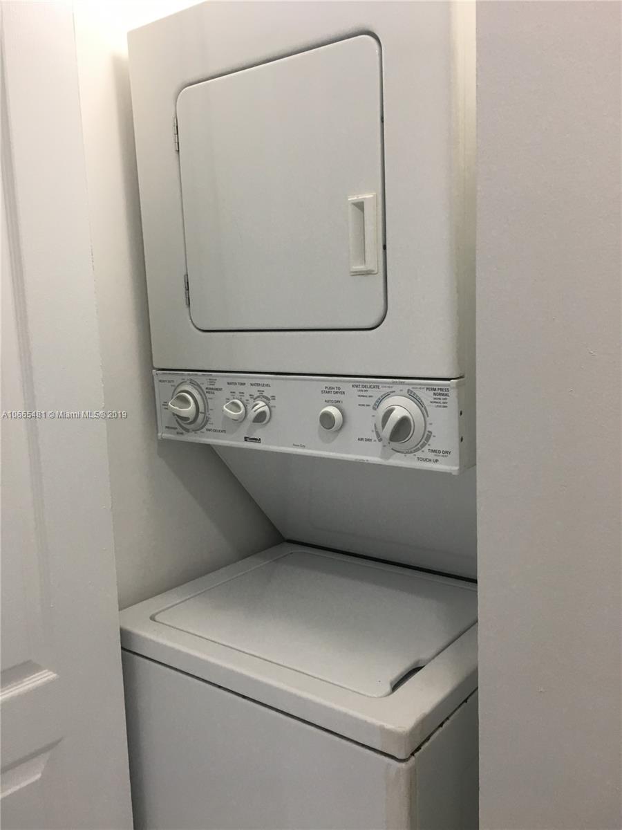 1453 Southwest 3rd Street, Unit 305 Miami, FL 33135 - Photo 9 of 12 a close up view of washer and dryer