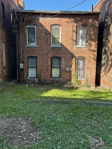 an aerial view of a house with mountain view