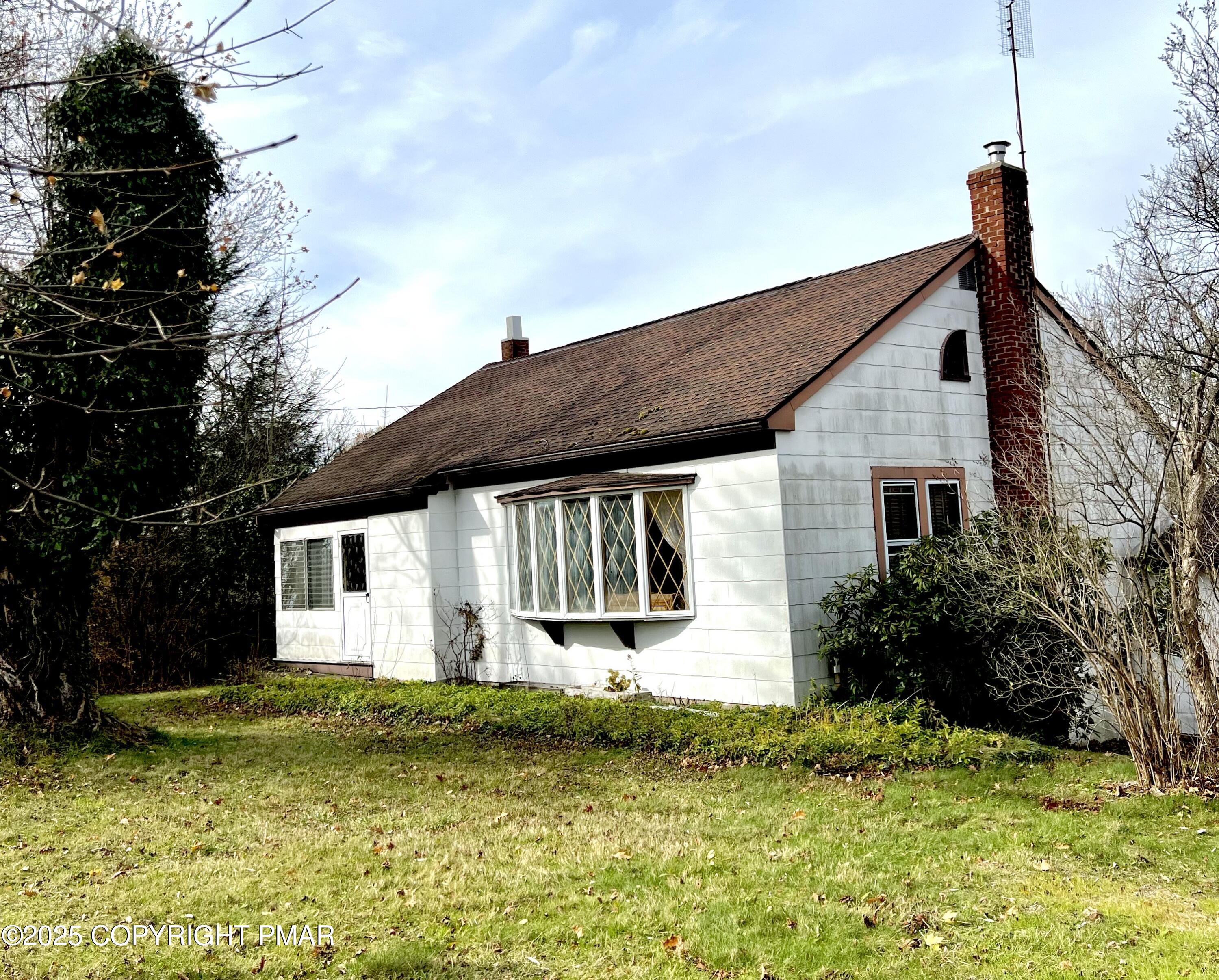 5 Gassen Road Honesdale, PA 18431 - Photo 2 of 15 a front view of a house with garden