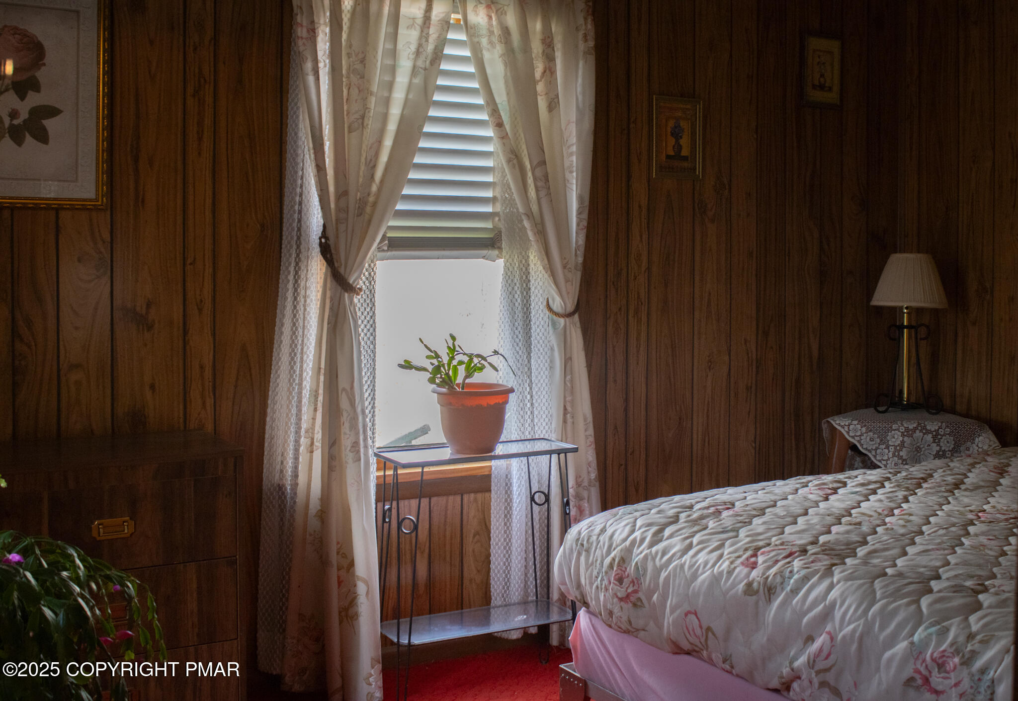 5 Gassen Road Honesdale, PA 18431 - Photo 8 of 15 a bedroom with a bed and a potted plant