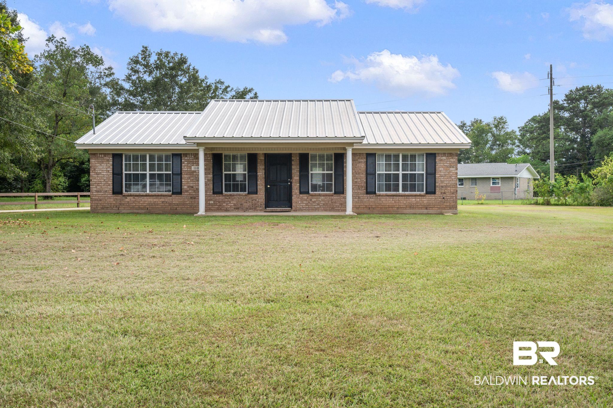 1107 North Oak Street Loxley, AL 36551 - Photo 1 of 40 Single story home with a front yard