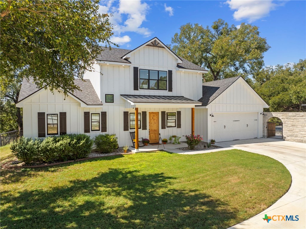 28099 Fm 2670 Killeen, TX 76549 - Photo 1 of 48 a front view of a house with a yard and garage