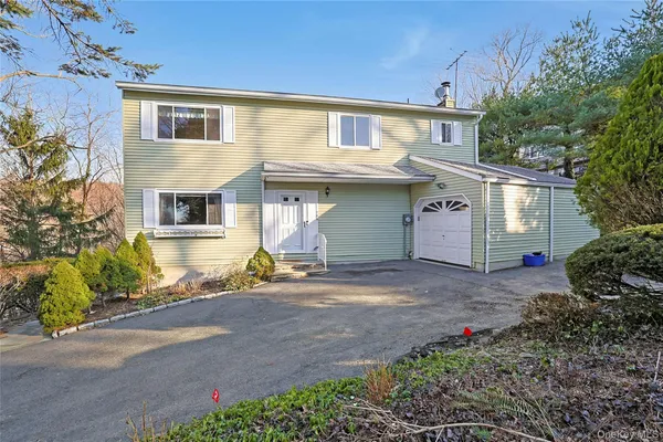 a view of a house with a patio