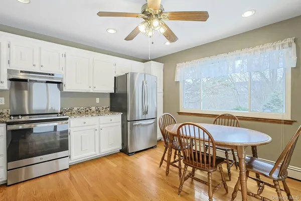 a view of terrace with wooden floor and fence