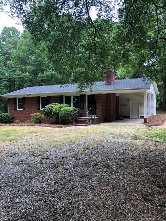 2117 White Store Road, Unit 126 Monroe, NC 28112 - Photo 2 of 20 a front view of house with yard and green space