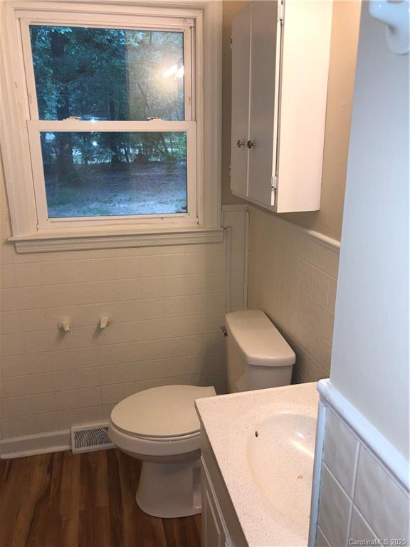 2117 White Store Road, Unit 126 Monroe, NC 28112 - Photo 12 of 20 a bathroom with a toilet and a sink