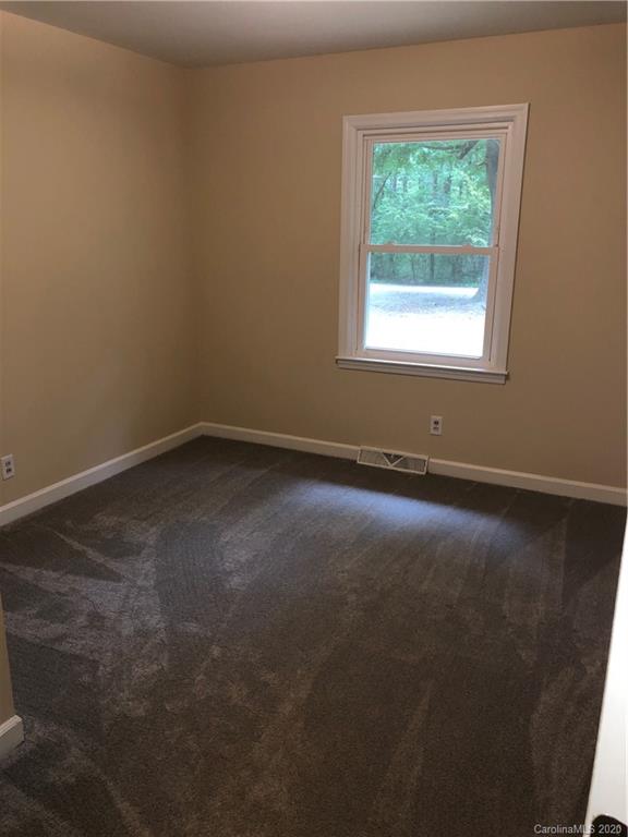 2117 White Store Road, Unit 126 Monroe, NC 28112 - Photo 14 of 20 an empty room with a window